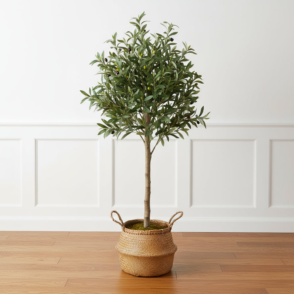 Artificial potted plant with green leaves on a white background